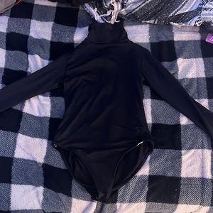Eurotard. XL Black long sleeve turtleneck bodysuit with buttons at the bottom